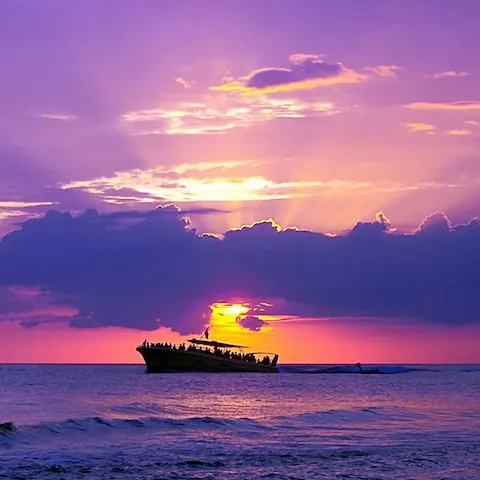 a sunset over a body of water