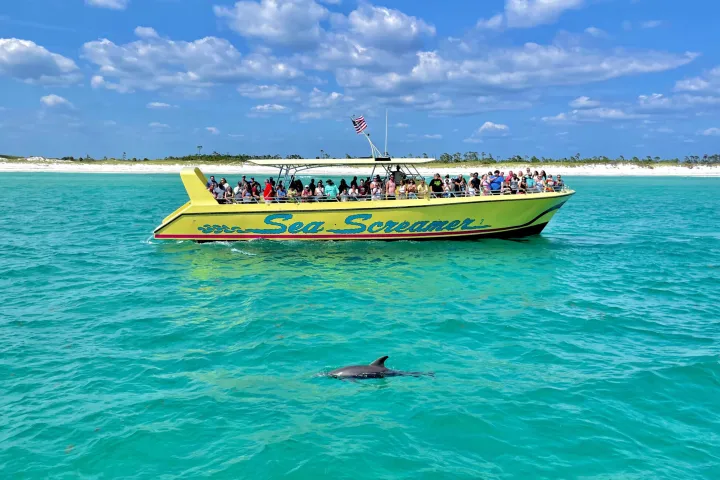 a small boat in a large body of water