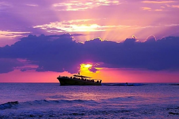 a sunset over a body of water